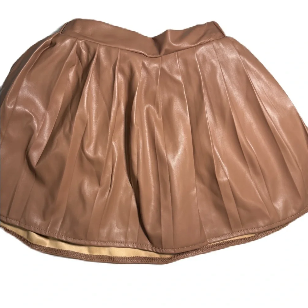 Stylish Tan Faux Fur Vest, ribbed top and faux leather pleated skirt